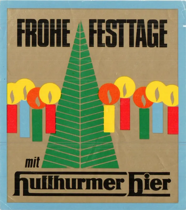 Foto: Bieretikett mit Weihnachtsbaum-Motiv und Aufschrift "Frohe Festtage"